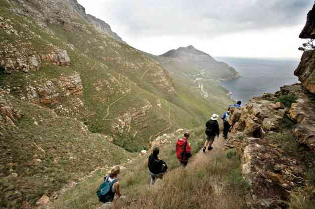 Looking down on Chapmans Peak Drive with Chapmans Peak behind - on the Hoerikwaggo Trail