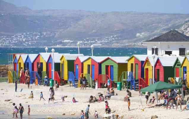 Saint James beach huts and people