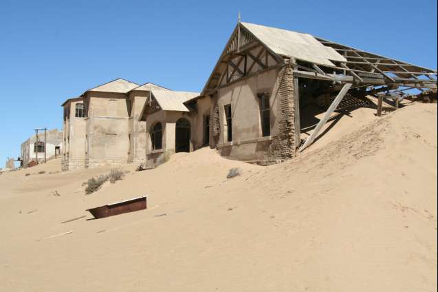 Abandoned sand-filled house in Kolmanskop, Namibia ghost-town