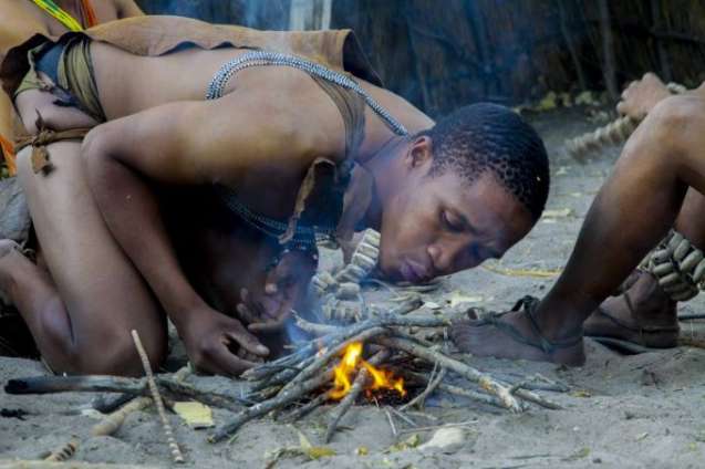 San Bushmen of the Kalahari demonstrating traditional tracking skills