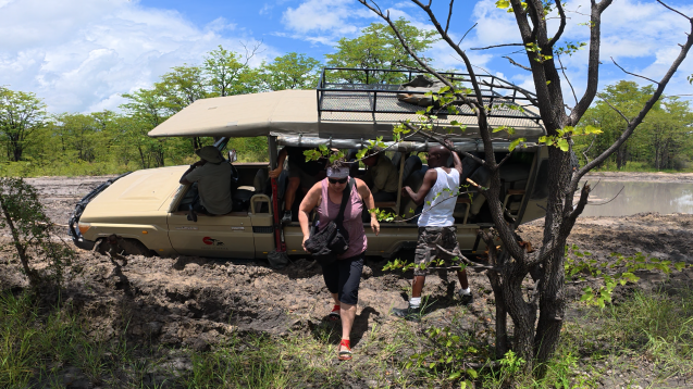 Overland safari group vehicle in mud
